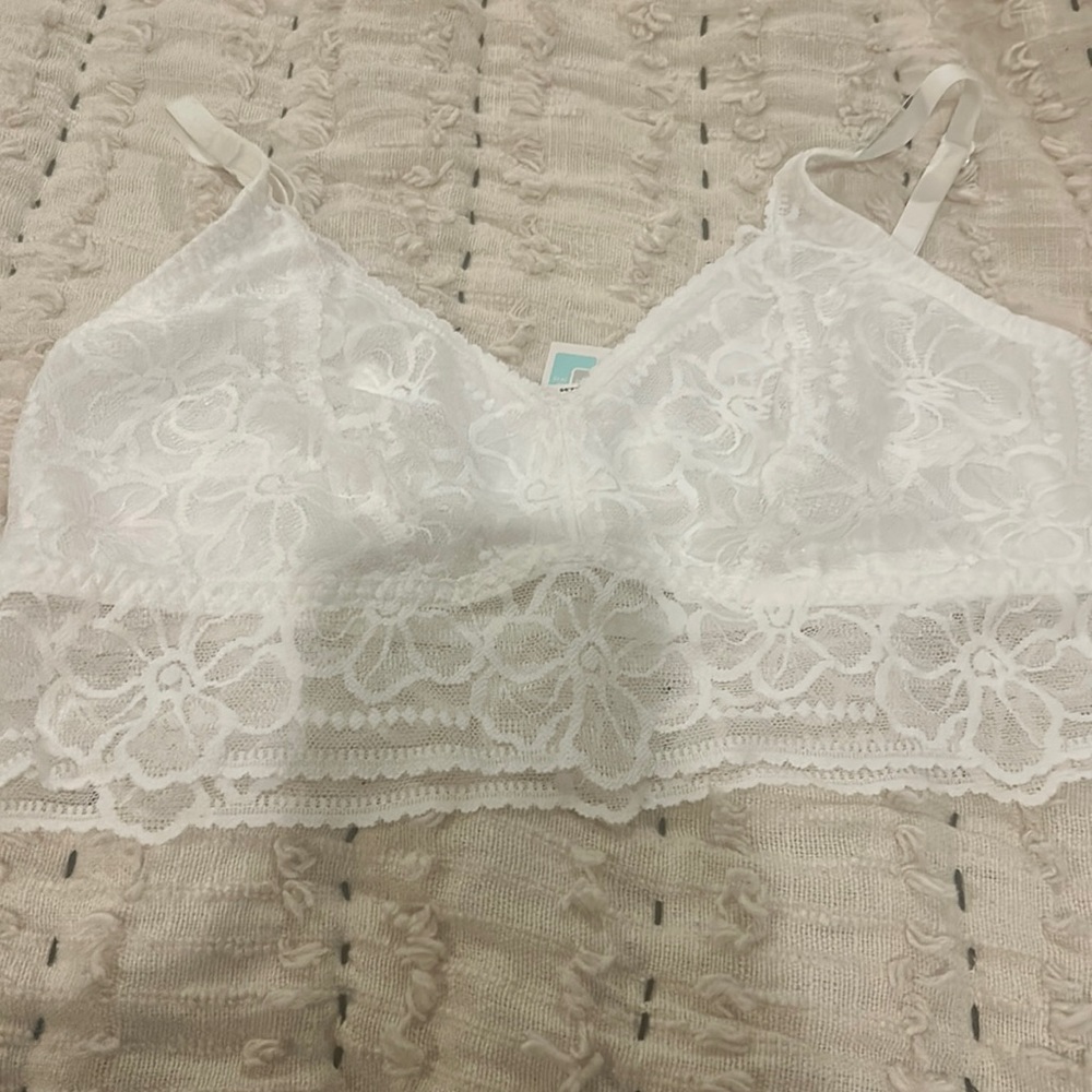 Victoria Secret Pink brand white bralette. NWT. Lace detailing. Unlined. Size L.